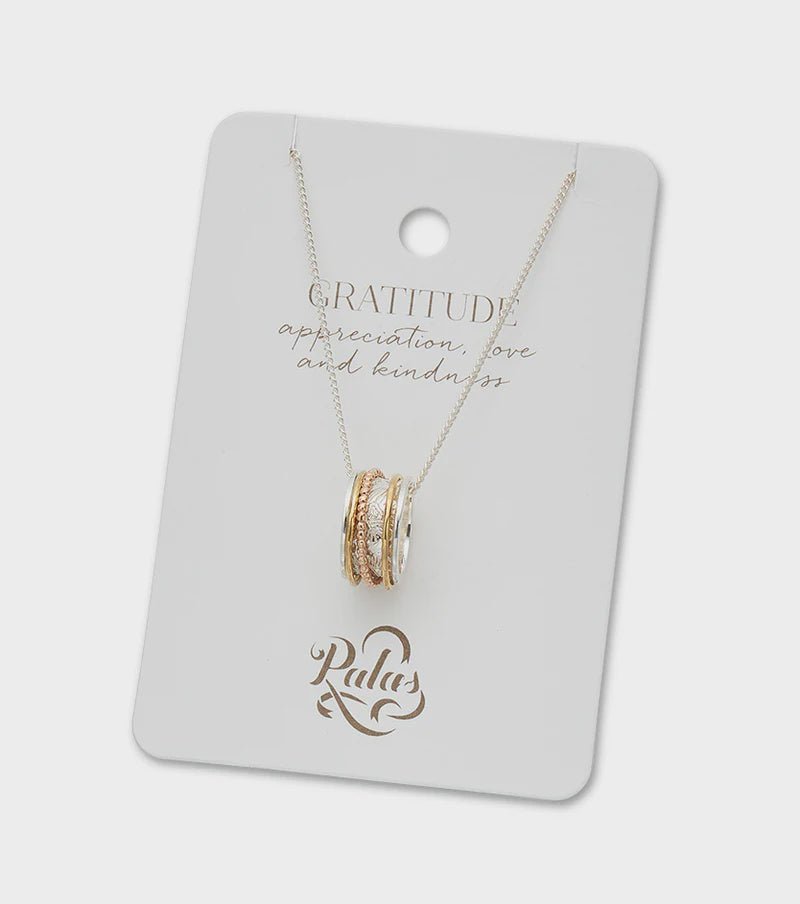 Buy Gratitude spinning meditation necklace by Palas - at White Doors & Co