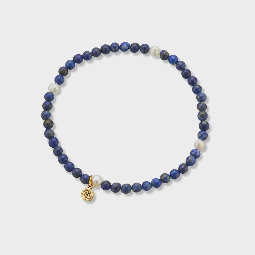 Buy Lapis lazuli & pearl prosperity gem bracelet by Palas - at White Doors & Co