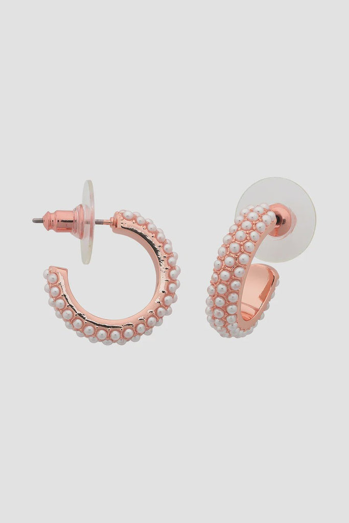Buy Marigold Rose Gold Pearl Earrings by Liberte - at White Doors & Co